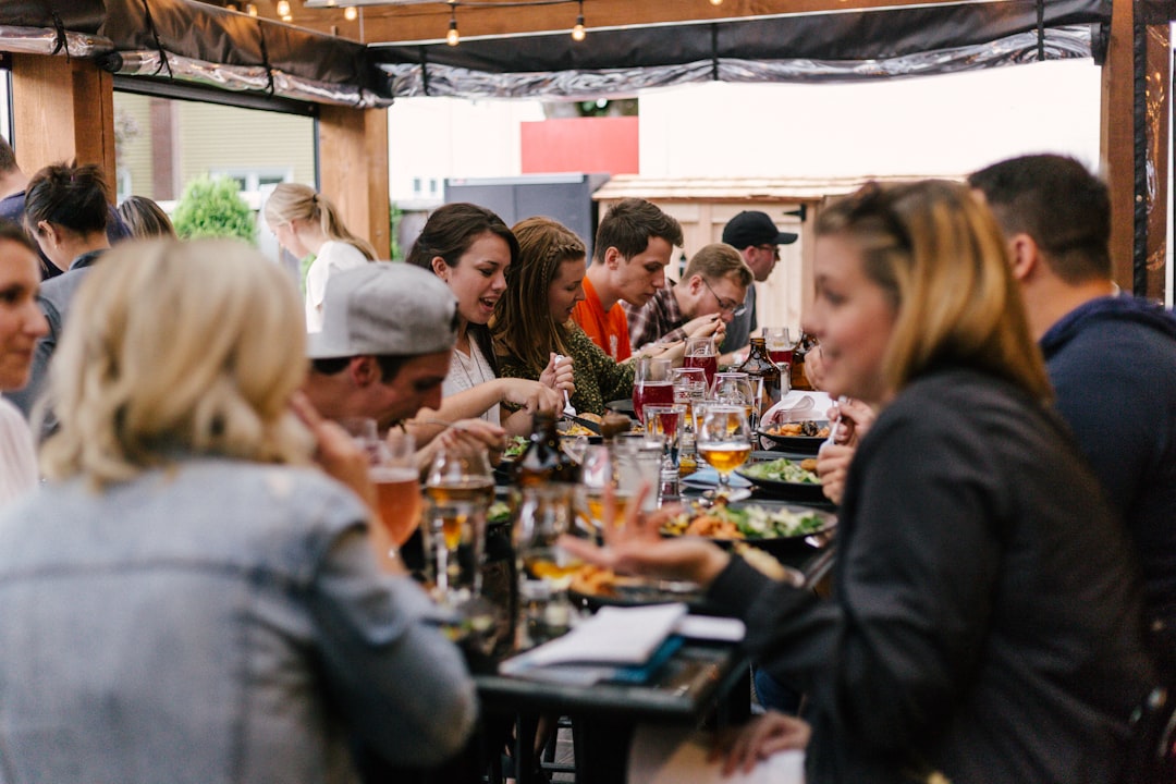 The Art of Drawing Readers In: Your attractive post title goes here People eating a meal around a table